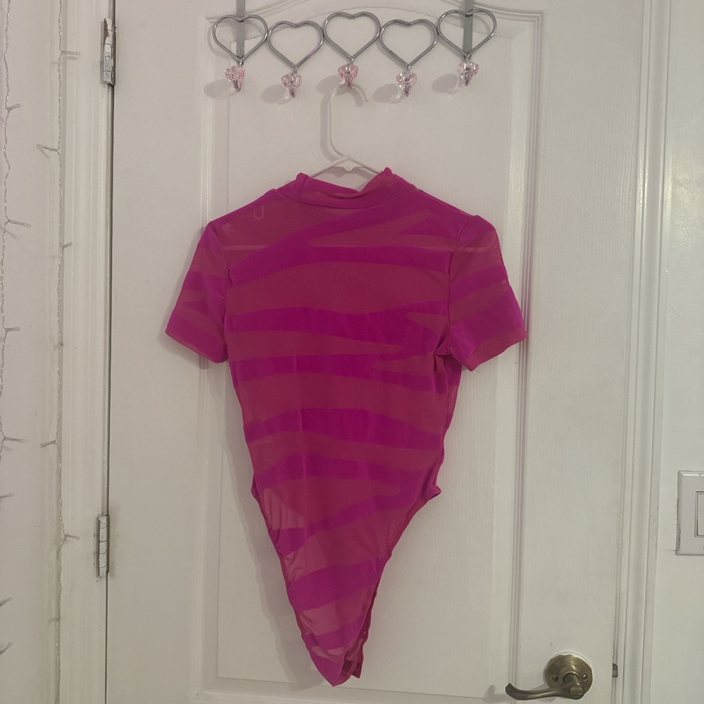 Hot pink body suit